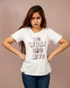 women standing and wearing a white printed womens tshirt